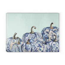 Load image into Gallery viewer, Chinoiserie Blue and White Pumpkins Glass Cutting Board on a kitchen counter